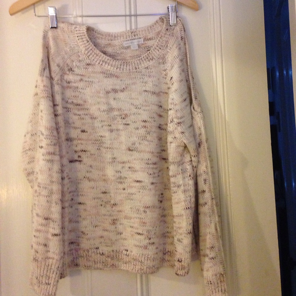Cold shoulder rose and multi bronze tone sweater.